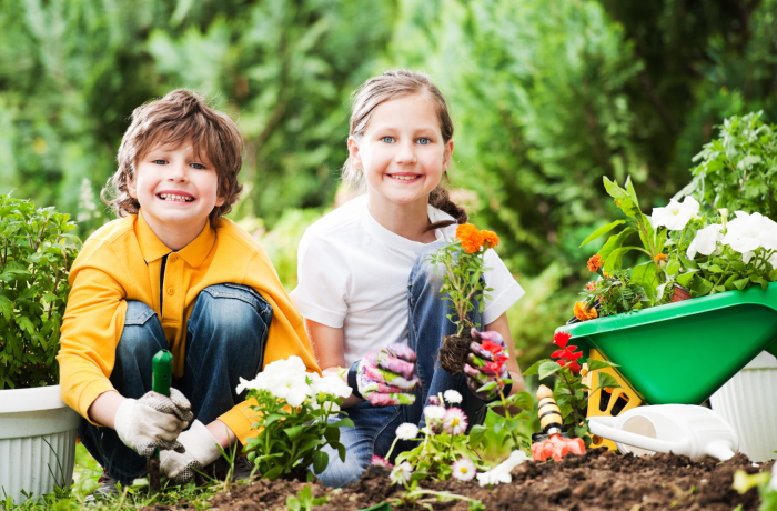 Boy and girl gardening