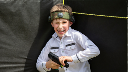 boy playing laser tag