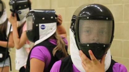 Gril in fencing mask