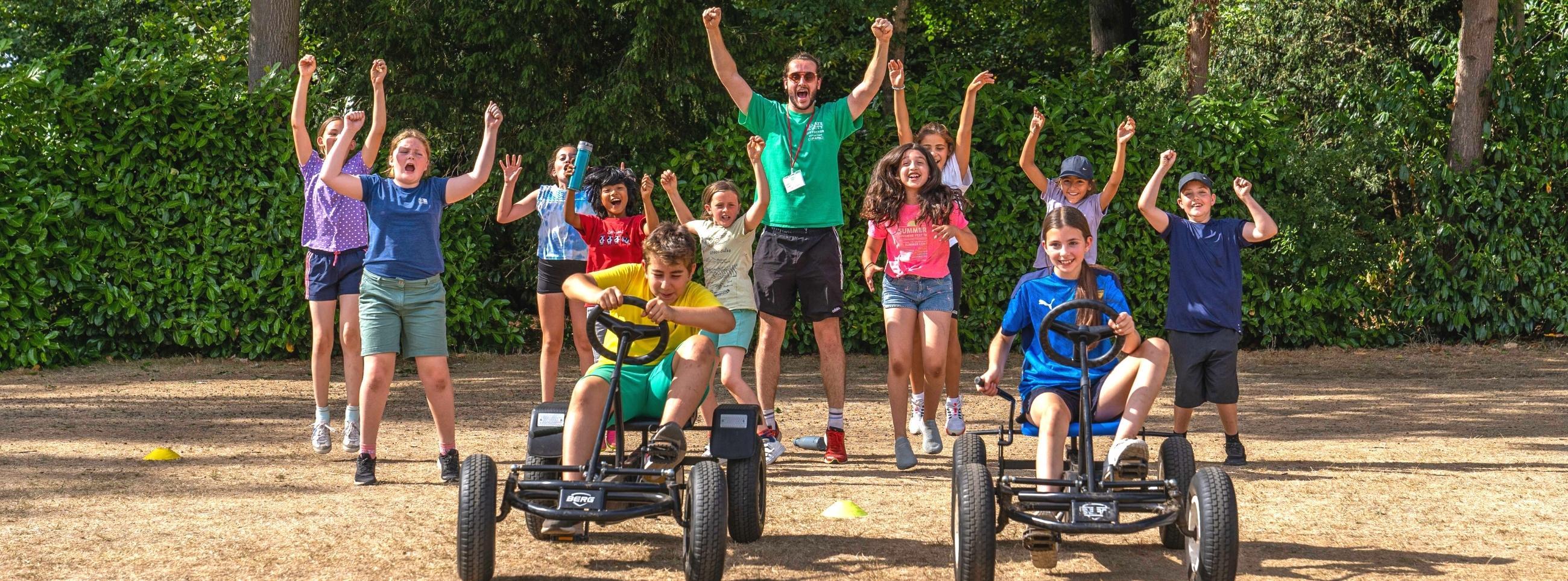 Children celebrating at a summer camp