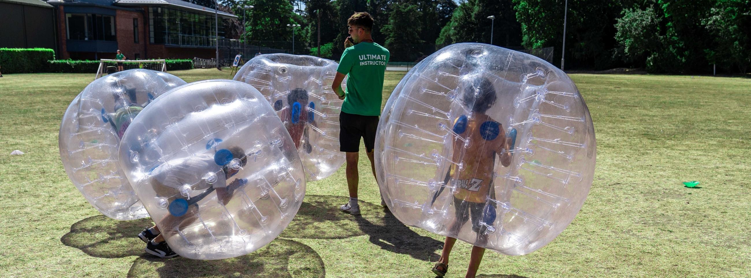 children and staff zorbing